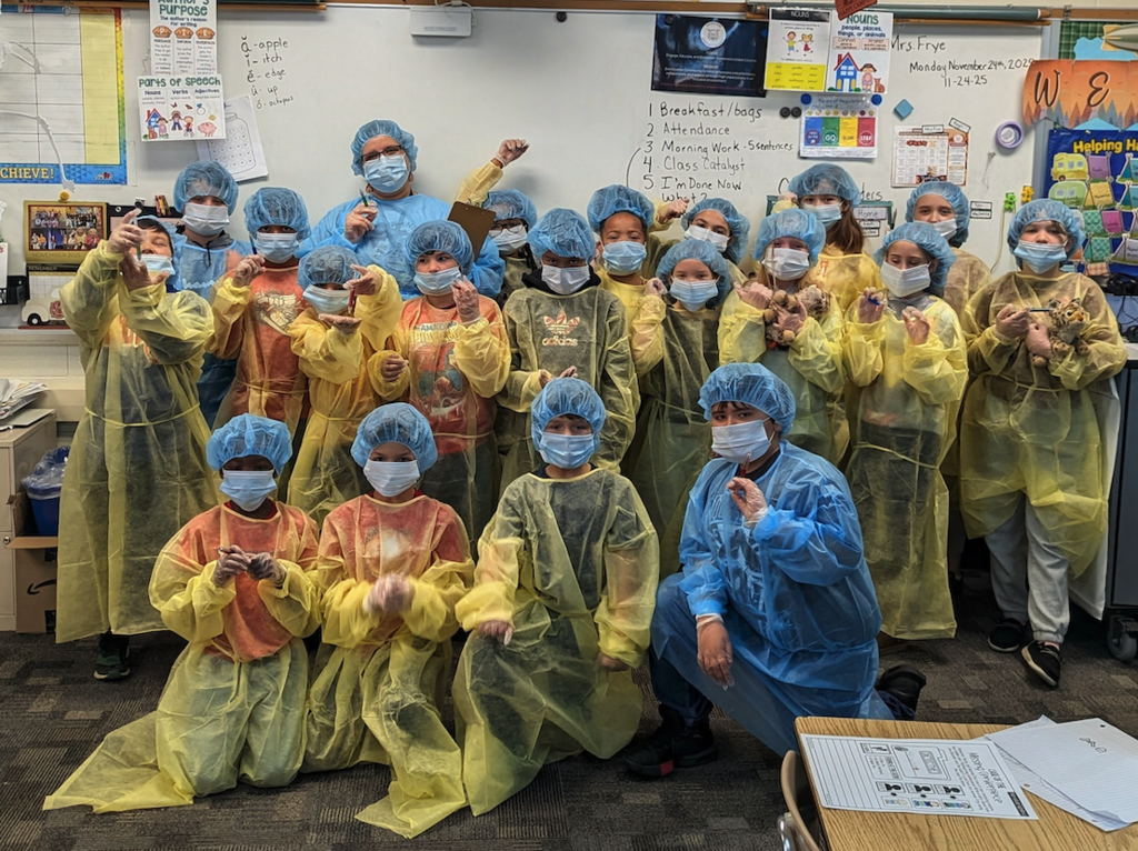 group of students dressed like doctors