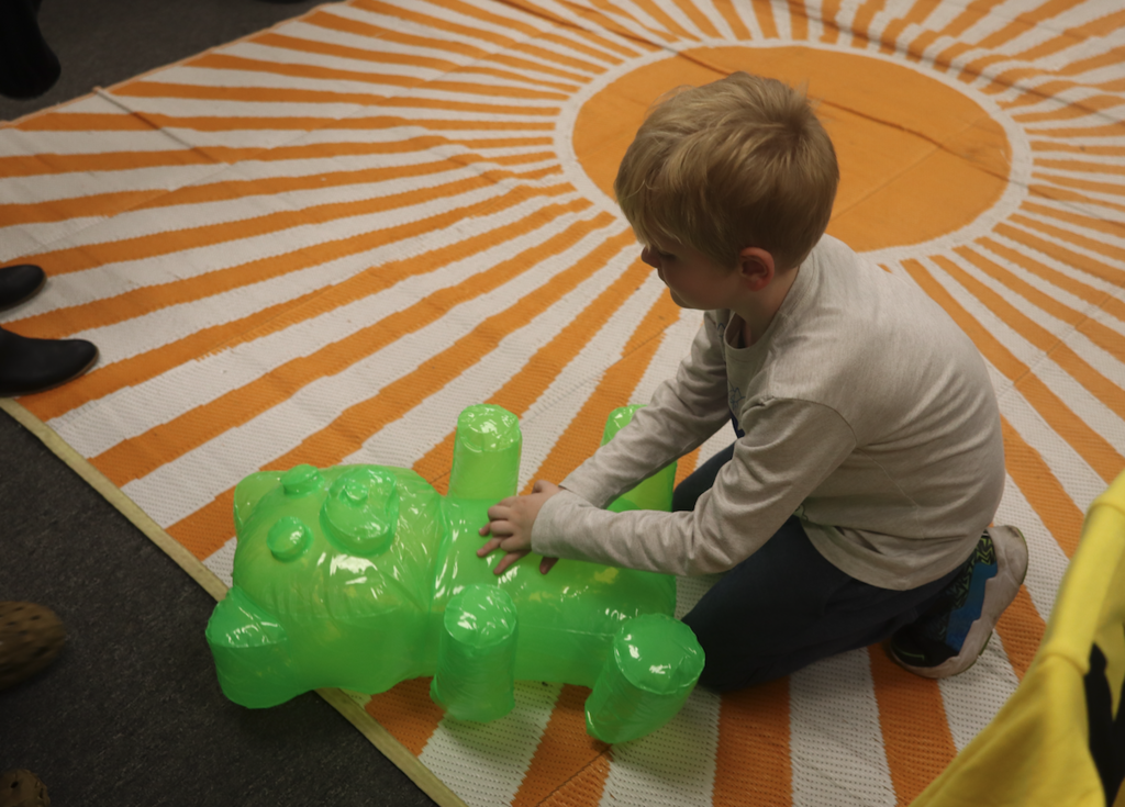 student doing cpr on gummy bears