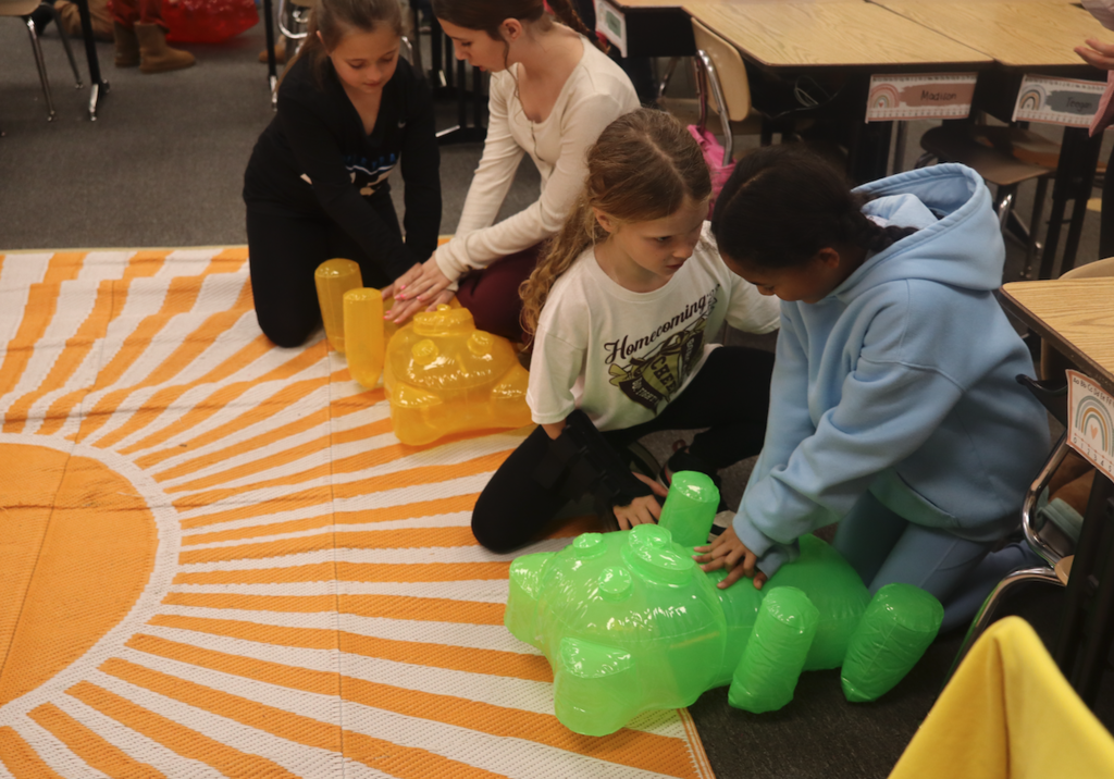 students doing cpr on gummy bears