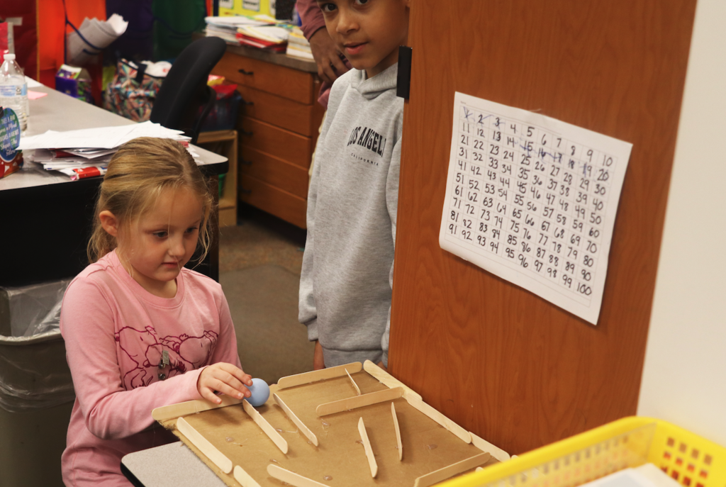 students playing ping pong ball