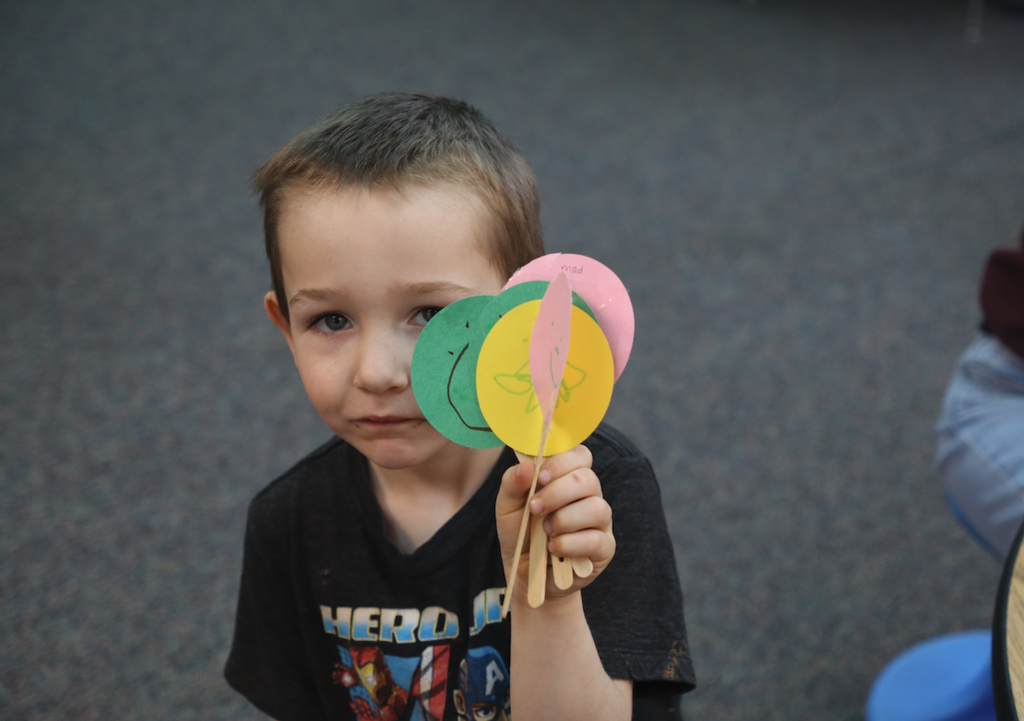 little boy holding emotions