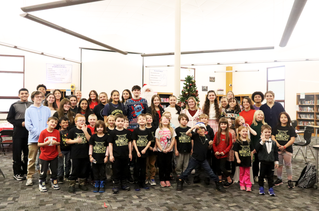 all students in a picture with Santa