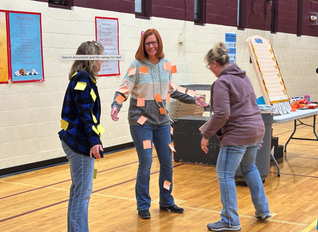 teachers with post it notes on them