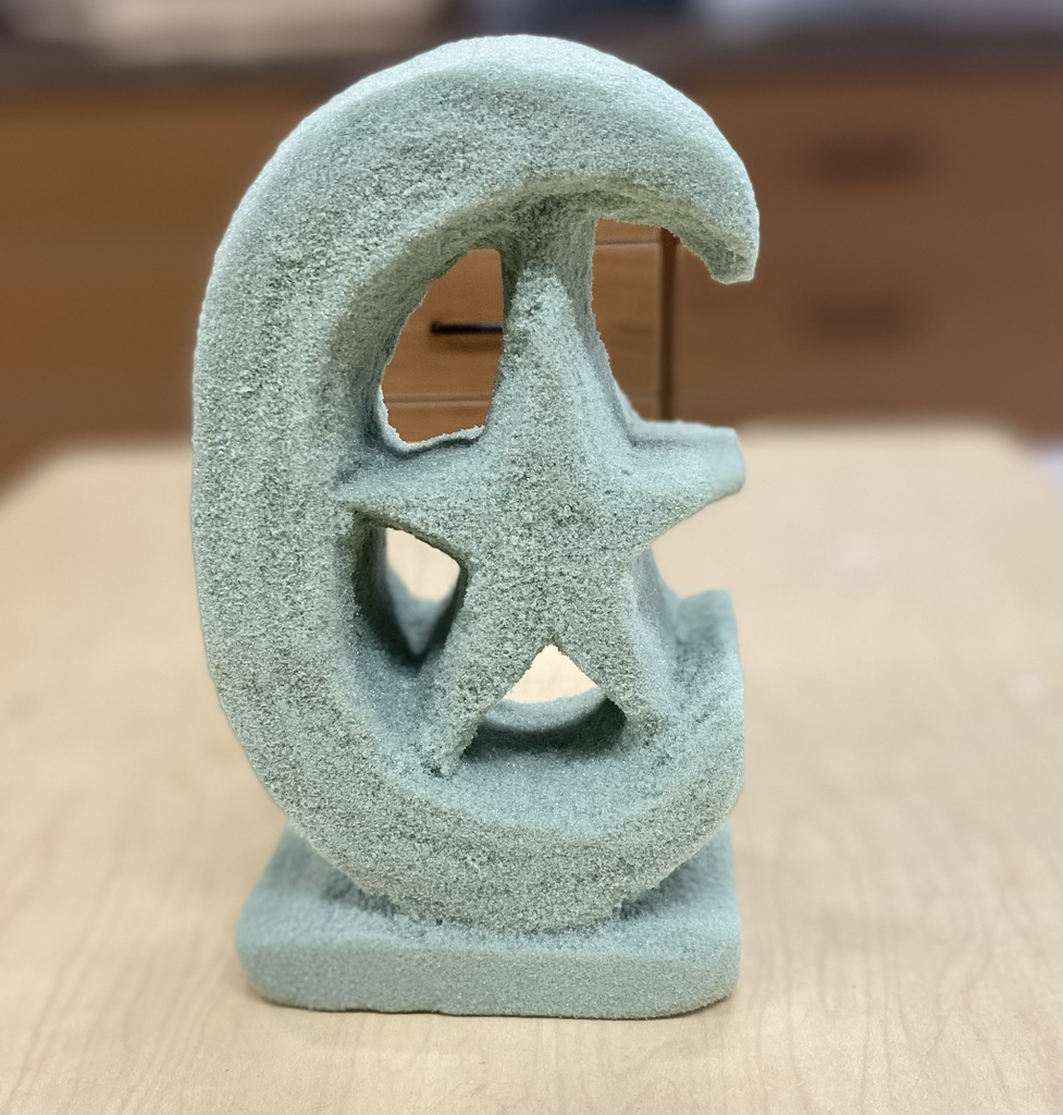 foam sculpture of moon and star