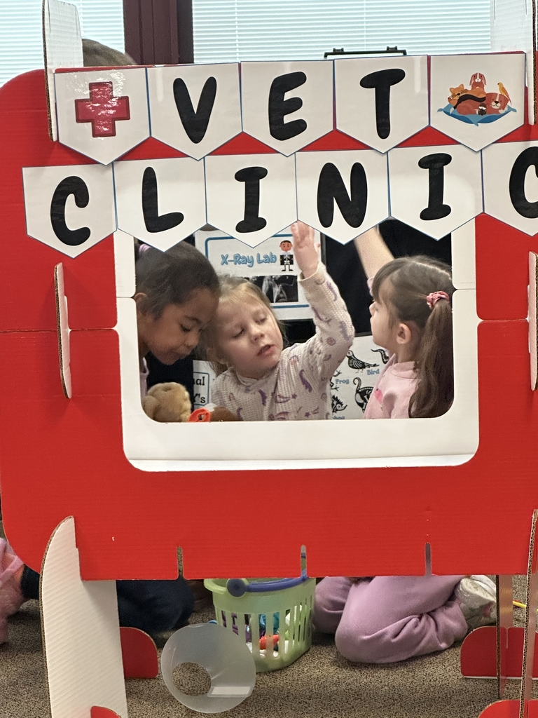 kids inside a play vet clinic