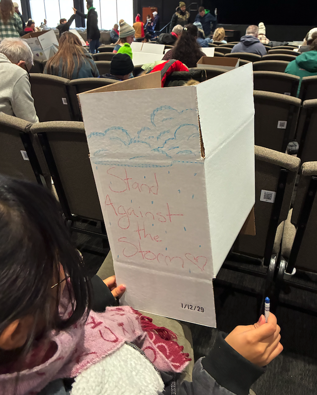 student decorating box for food drop