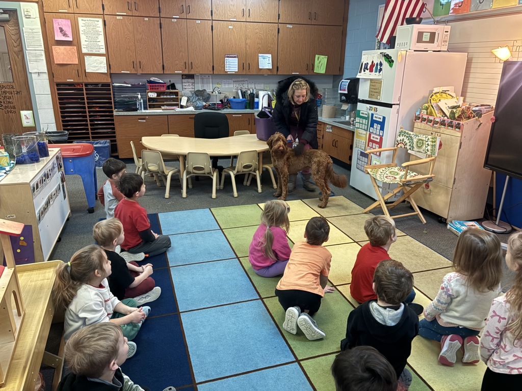 copper standing in front of classroom
