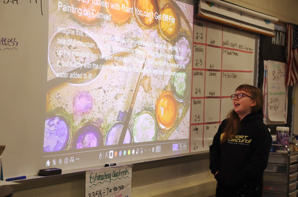 young girl presenting