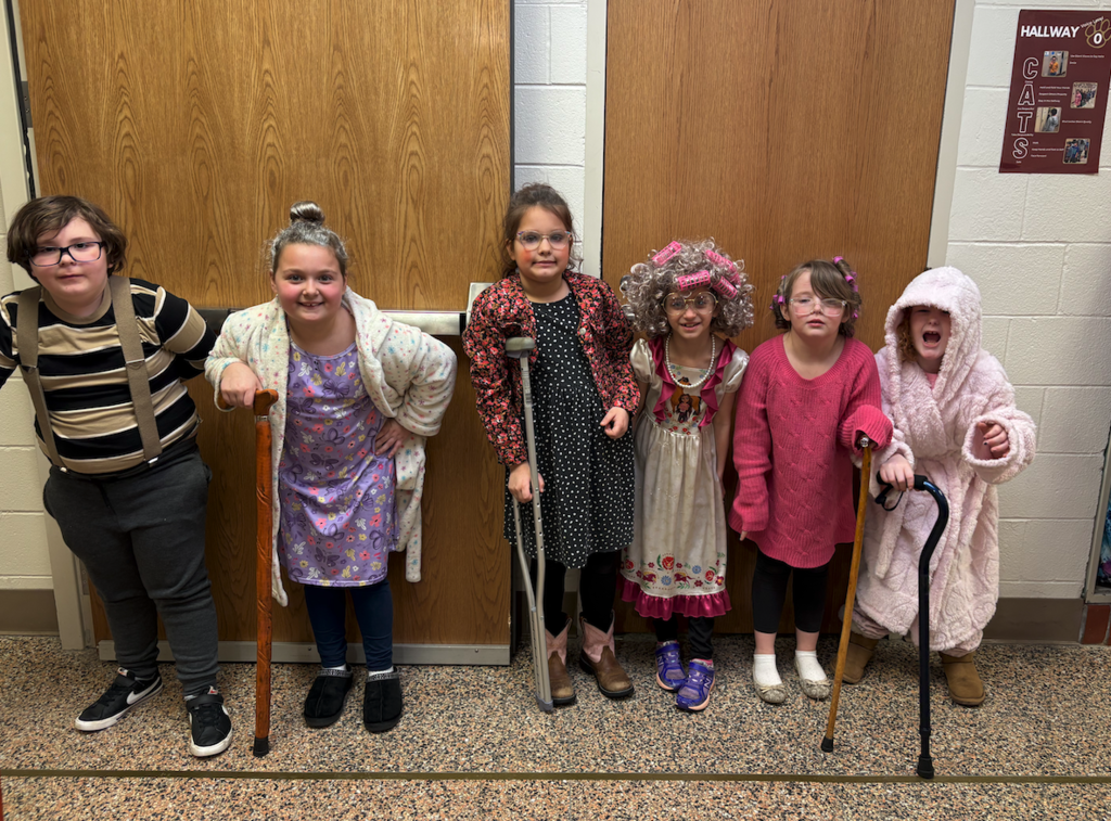 group of second graders dressed as 99 years old