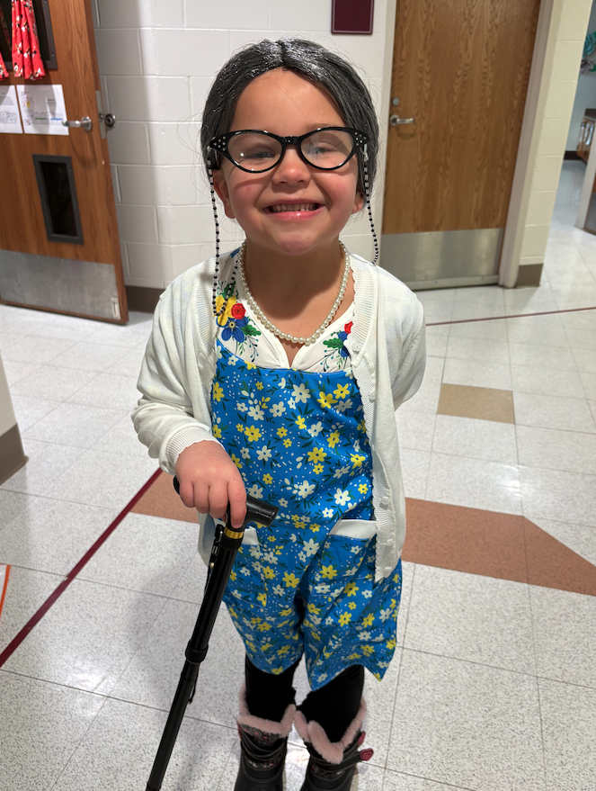 little girl dressed up like old woman