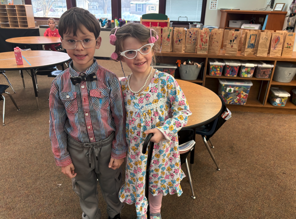 little boy and little girl dressed as old people
