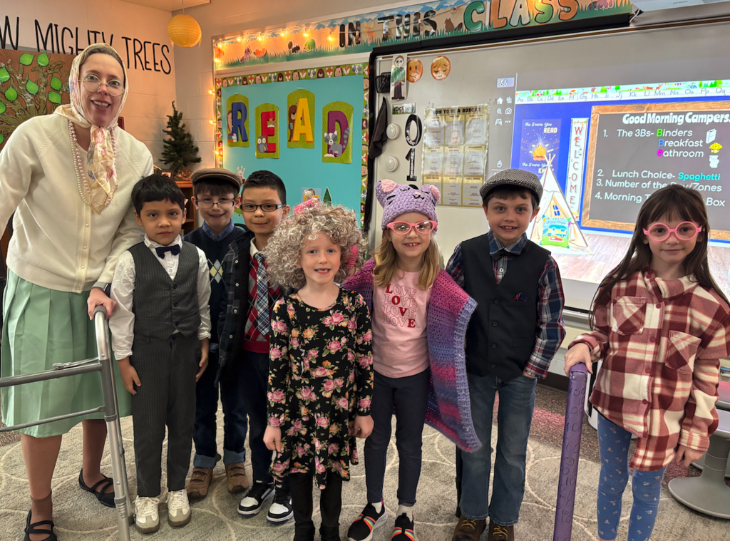 teacher and 7 kids dressed as old people 