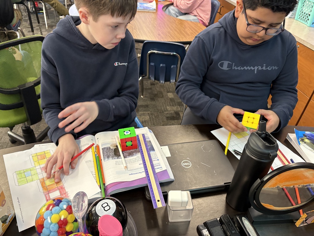 two boys creating cubes
