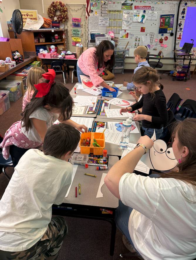 kids playing a game at Valentine's Day party