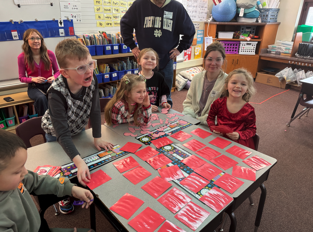 kids playing a game at Valentine's Day party