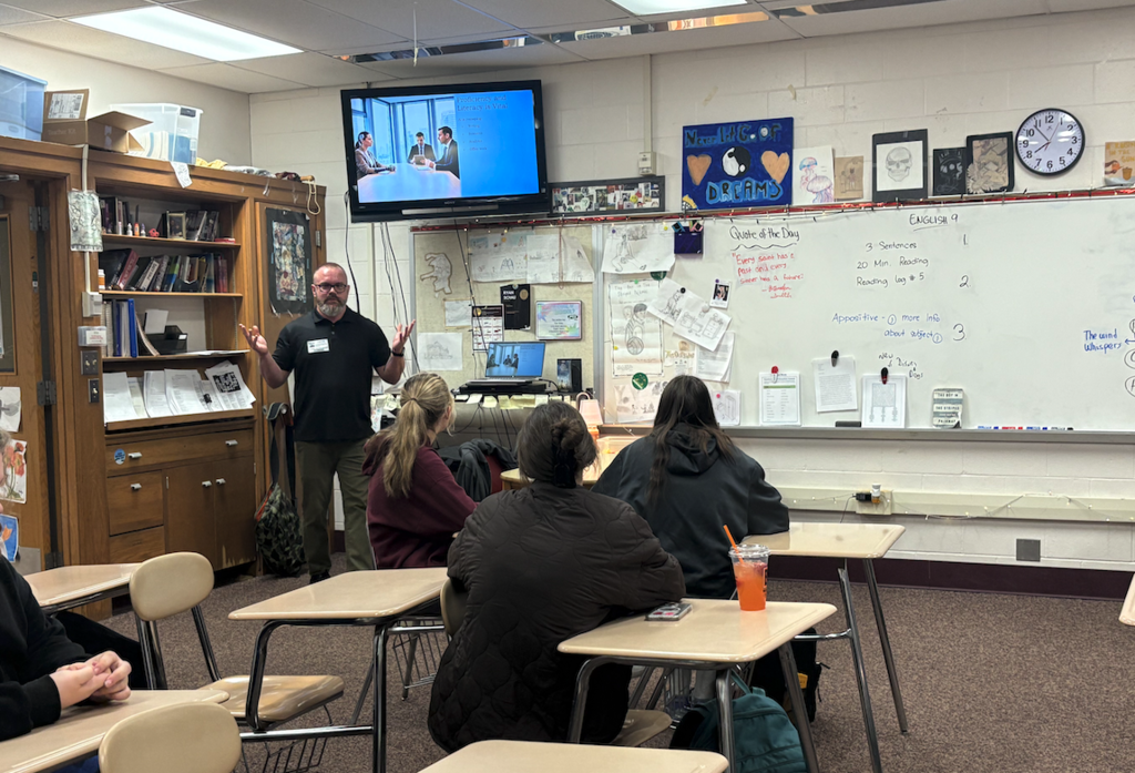 speaker talking to students about AI