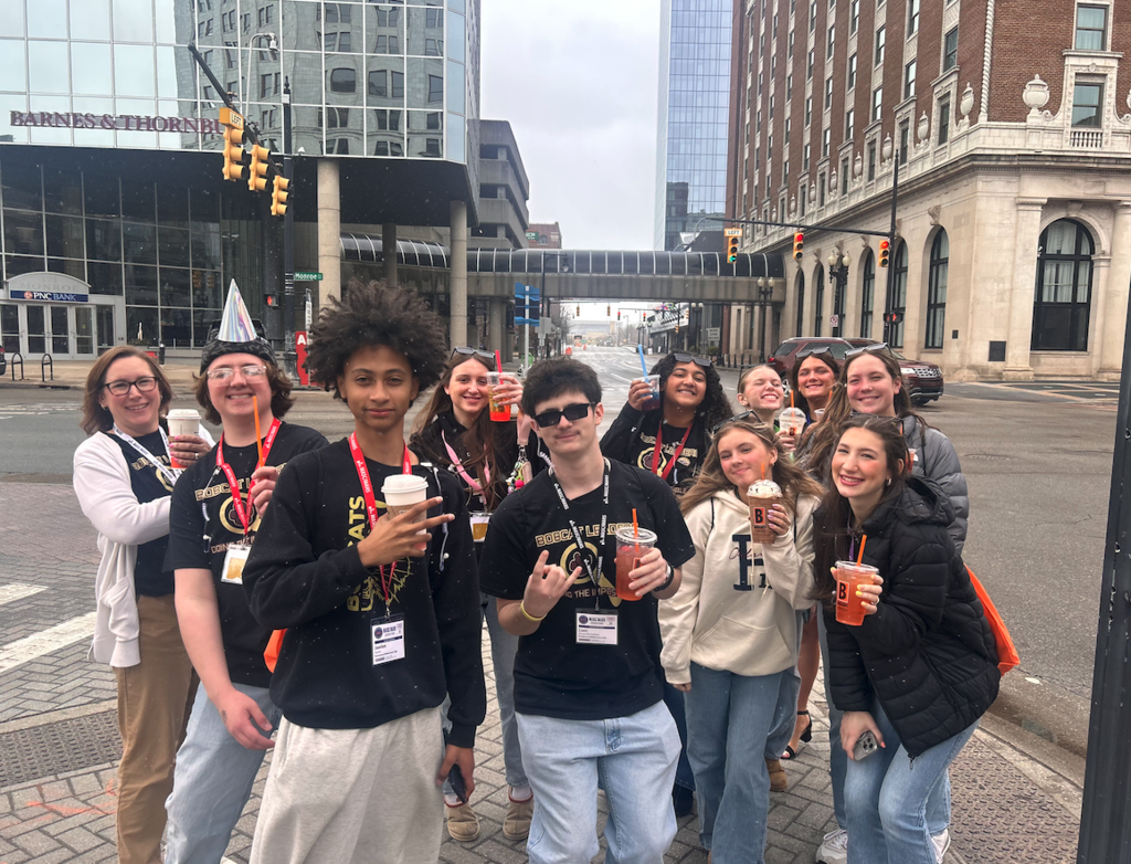 students in street with bigby