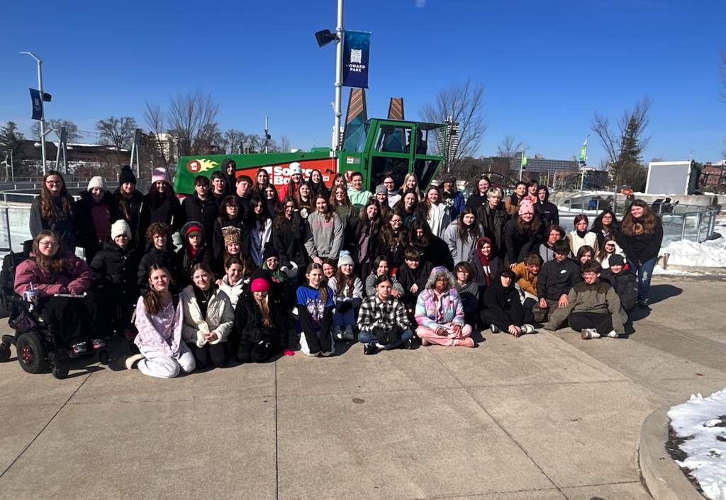 group of middle schoolers at ice skating rink
