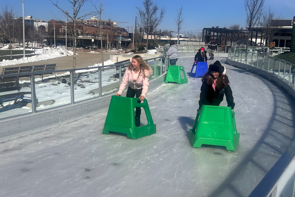 two girls ice skating