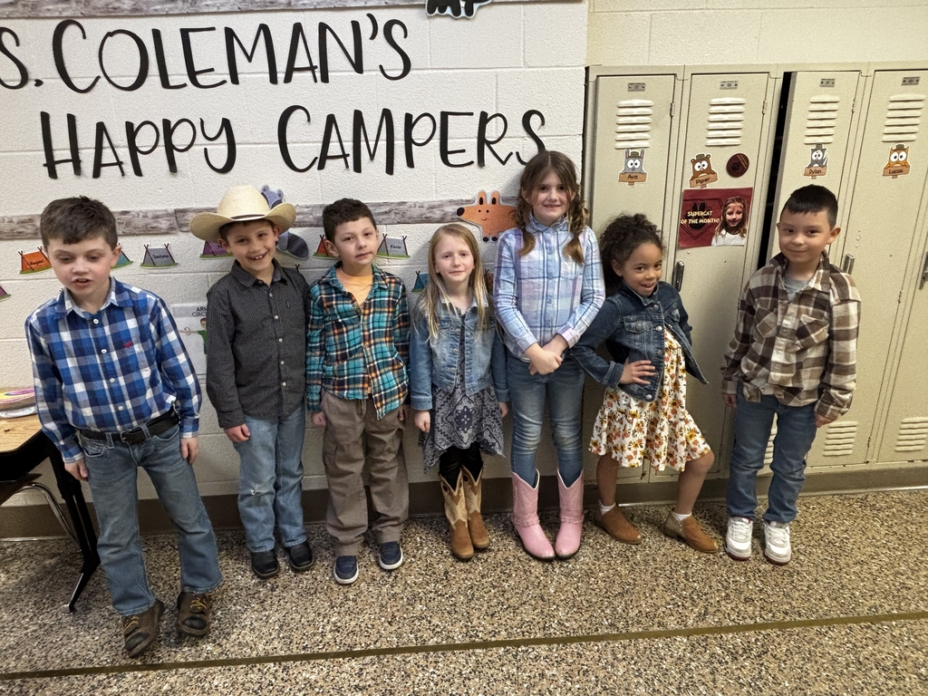 group of students dressed up in country wear