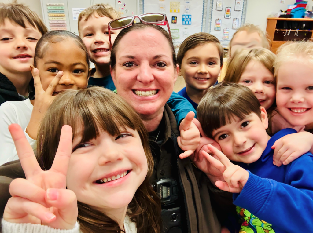 group of kindergarteners with deputy