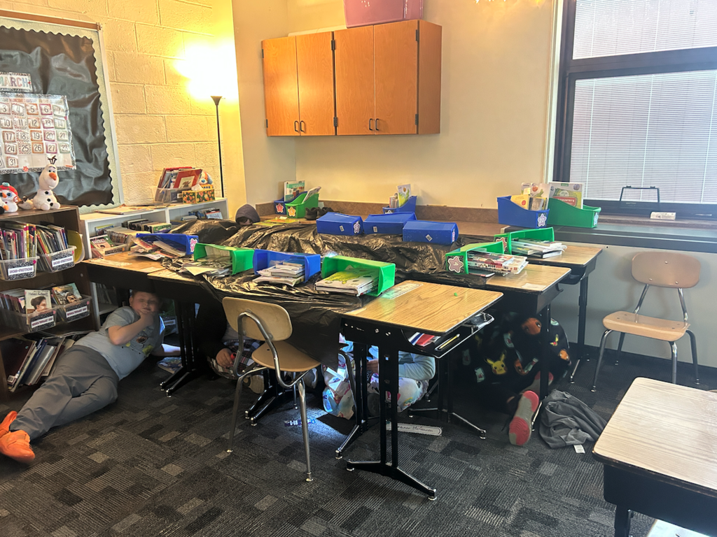 kids under desks reading