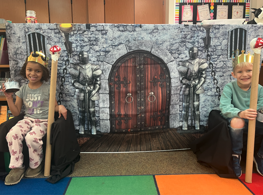 two little kids dressed as royalty