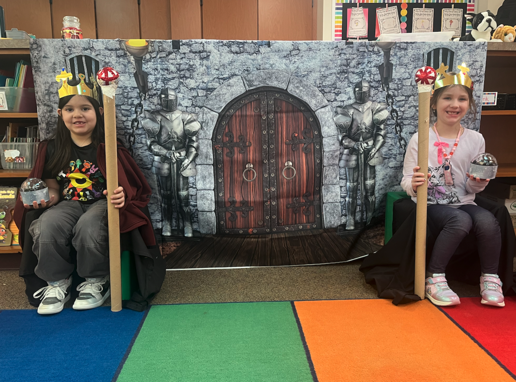 two little kids dressed as royalty