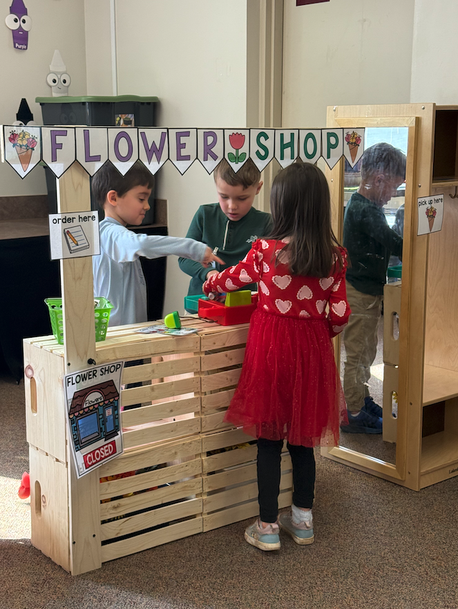 kids playing at flower shop