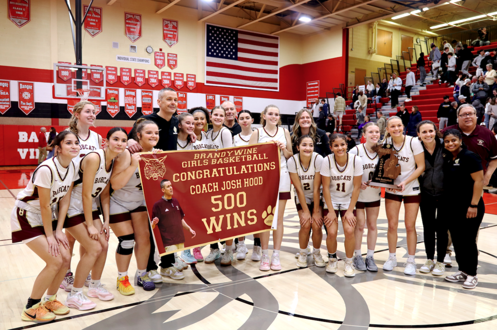 team with coach for 500 wins