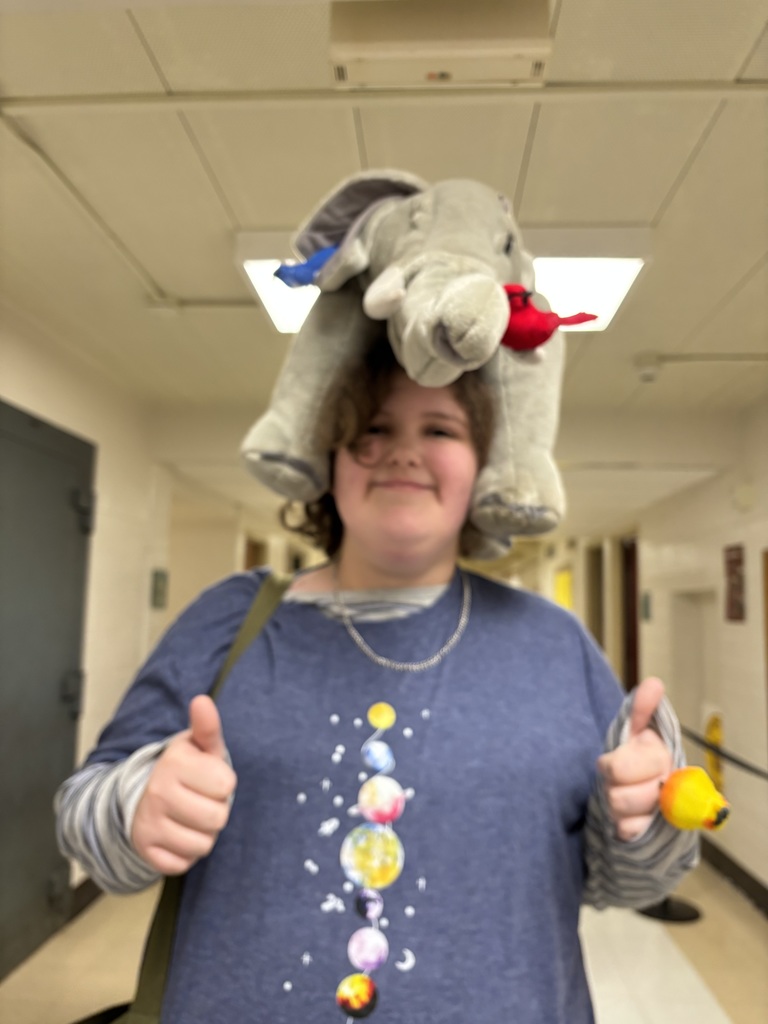 girl dressed with elephant on head