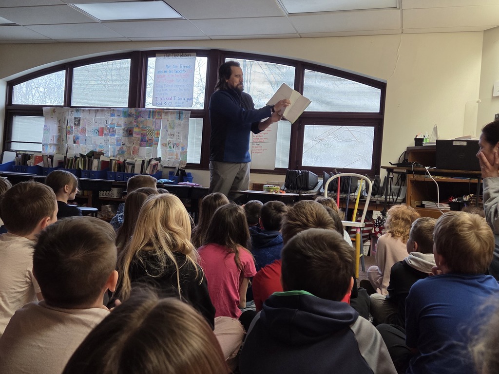 state rep brad \paquette reading to class