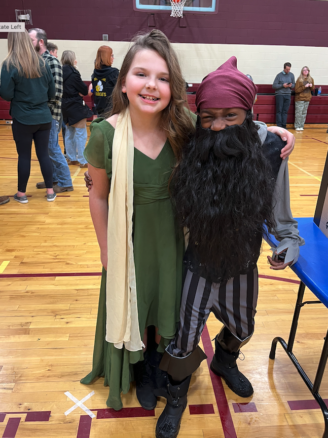 two kids dressed up for wax museum