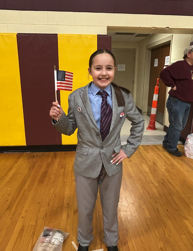 kid dressed up as president for wax museum