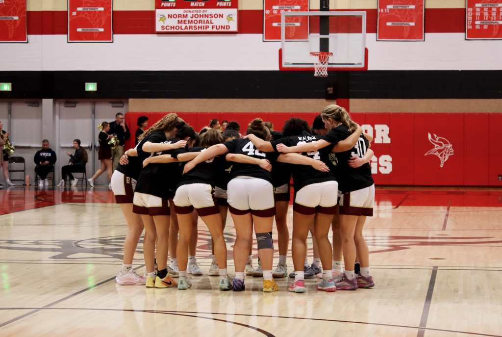 basketball girls in a huddle