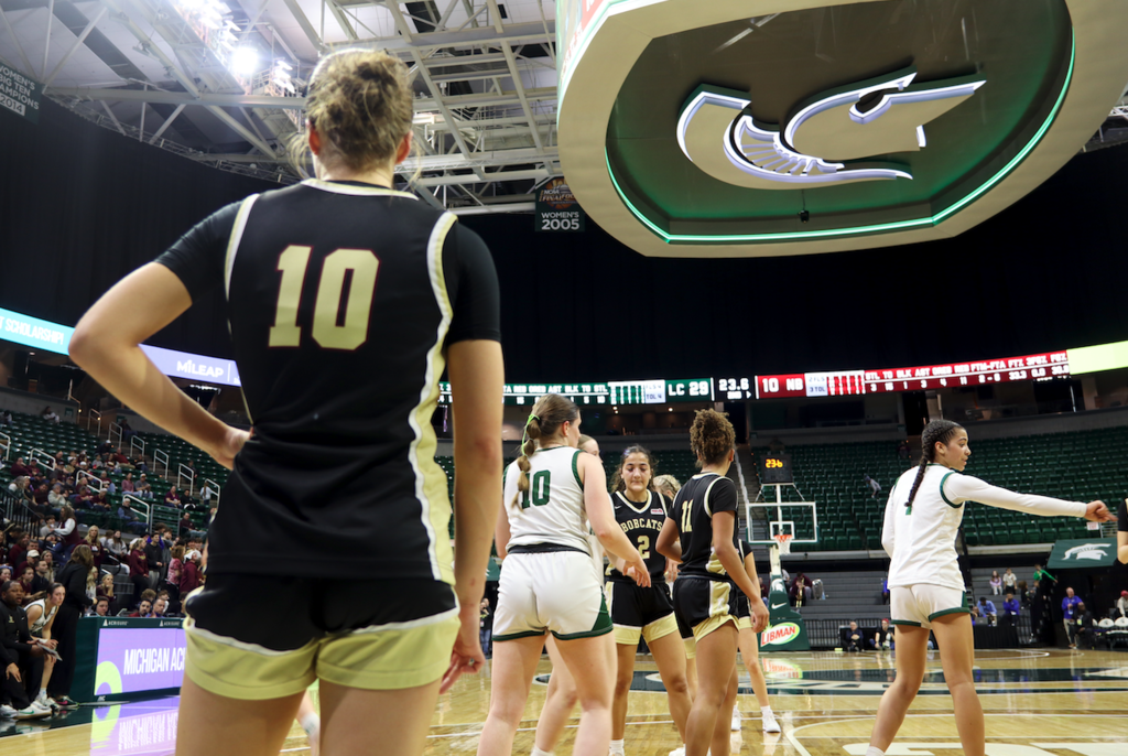 player standing on court at MSU