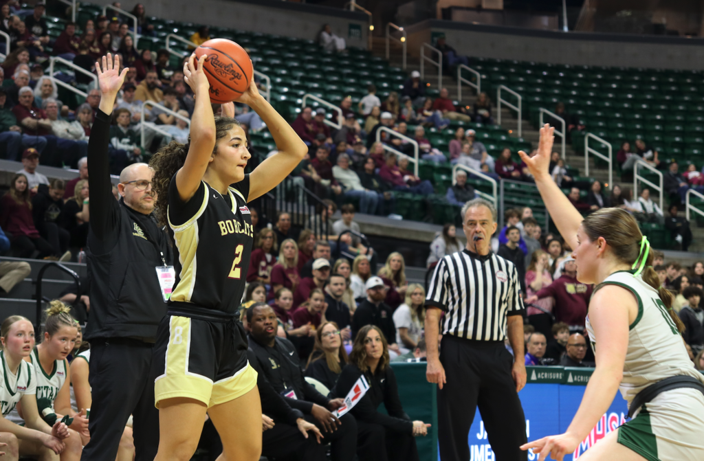 basketball player throwing ball