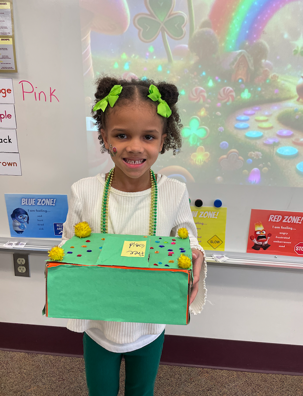 young girl with leprechaun trap
