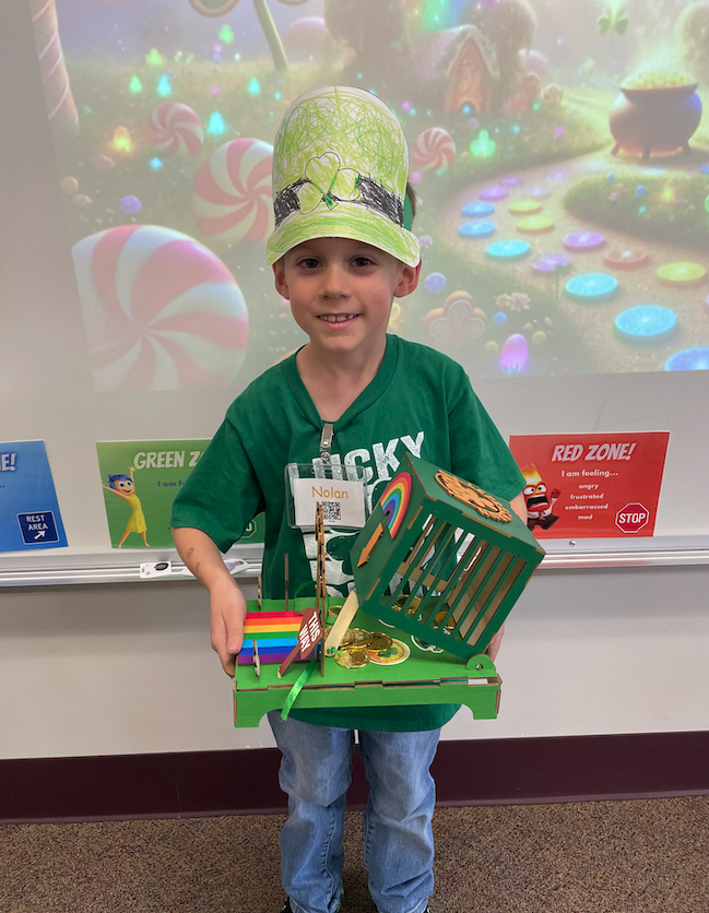 young boy with leprechaun trap