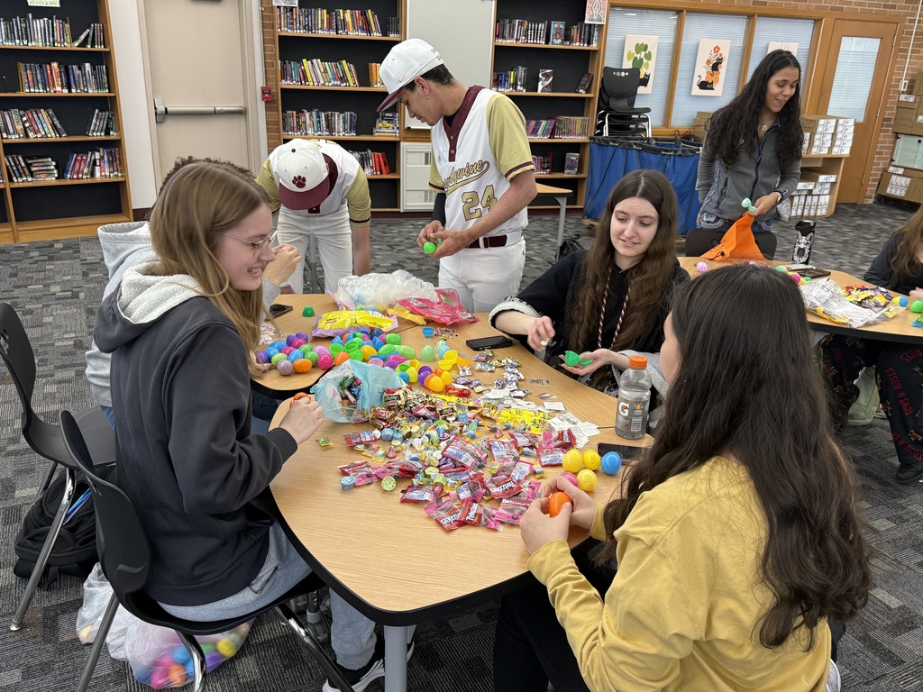 students filling eggs
