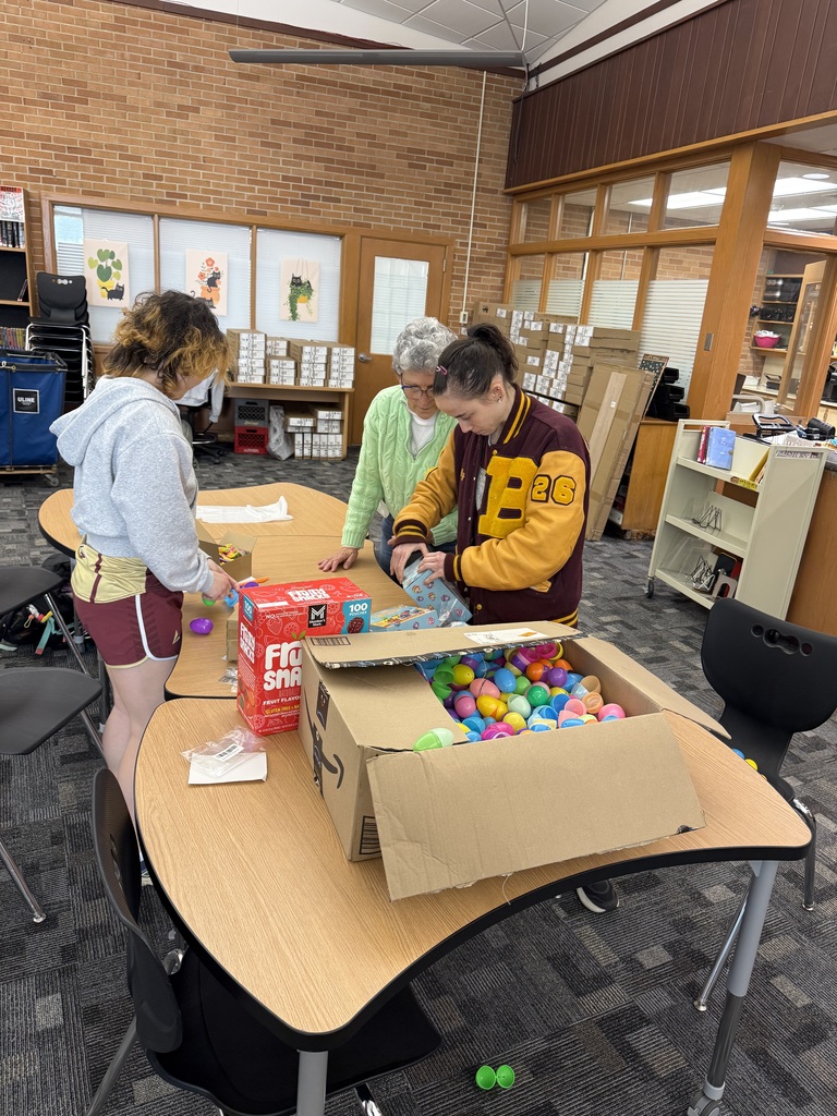 students filling eggs