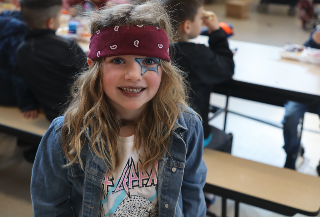 little girl dressed up as rockstar