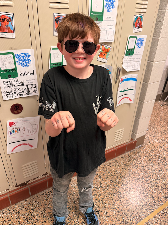 little boy dressed up as rockstar