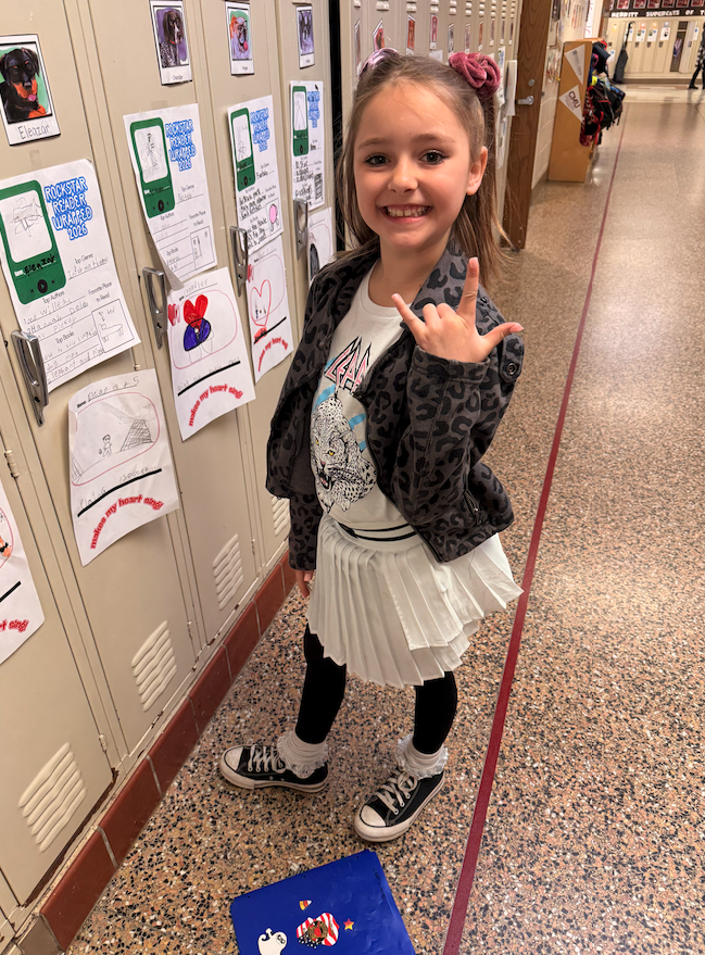 little girl dressed up as rockstar