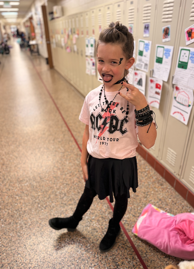 little girl dressed up as rockstar