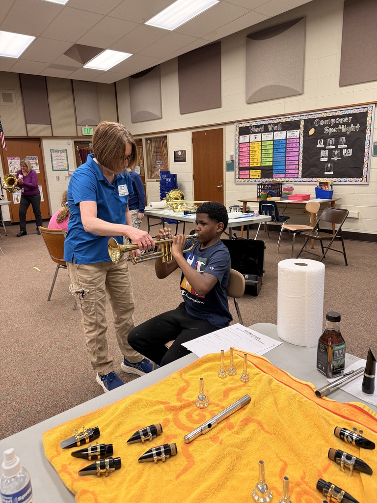 student playing intrusment