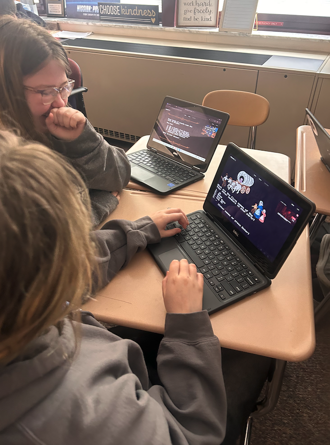 two kids on computer