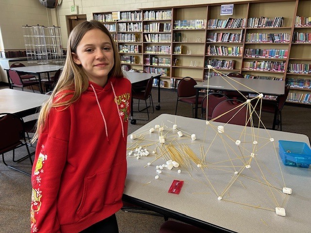 girl with marshmallow tower