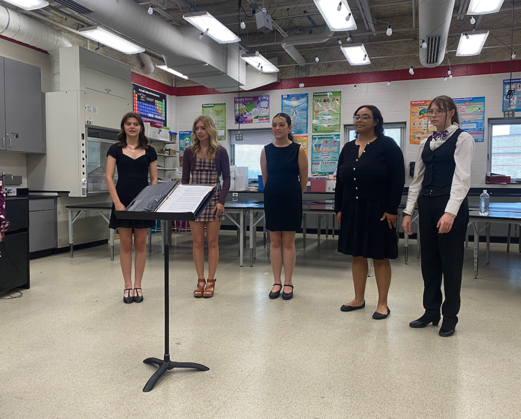 five choir girls performing