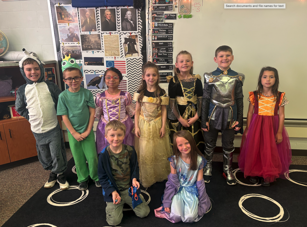 group of first graders dressed up in fairytale costumes